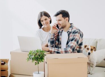 image of two people moving houses for best fit movers