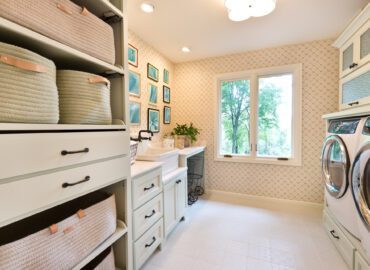 beautiful white laundry room with window